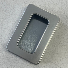 Metal tin with viewing window
